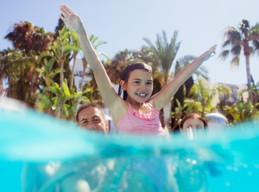 Girl striking a pse in the swimming pool